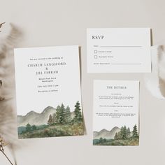 wedding stationery with mountains and pine trees