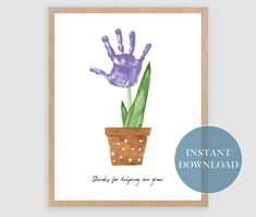 a card with an image of a handprinted flower in a pot and the words instant