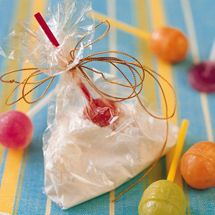 a bag filled with candies on top of a table