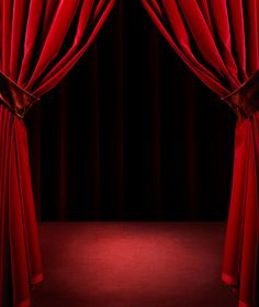 an open red curtain with dark background