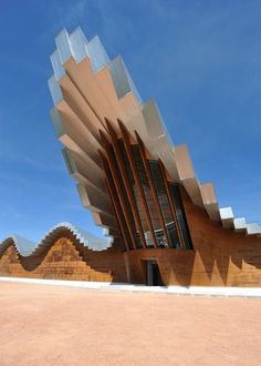 a large building that looks like it is made out of wood