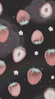 some pink strawberries are floating in the air with clovers around them on a black background