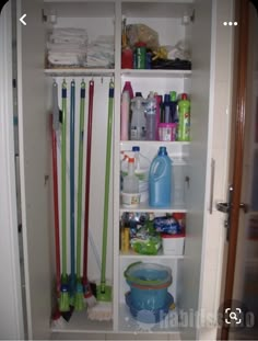 the closet is filled with cleaning products and supplies