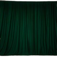 the green curtain is closed and ready to be used as a backdrop for an event