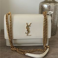 Natural Leather. Perfect Condition, Looks Like A Brand New. Cream Ysl Bag, Beige Bag With Dust Bag For Everyday Luxury, Designer Beige Bags For Everyday Luxury, Luxury Beige Shoulder Bag For Everyday, Designer Rectangular Shoulder Bag For Everyday Luxury, Luxury White Square Bag, Luxury White Square Bags, High-end Cream Shoulder Bag, Designer Square Shoulder Bag For Everyday Luxury