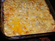 a casserole dish with cheese and onions in it