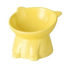 a yellow cat shaped bowl on a white background