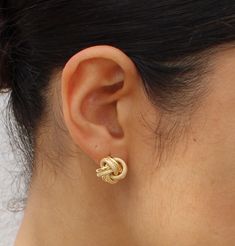 Our lovely 18kt gold knot earrings are a touch of elegance and class to your look. These essential pair will surely bring that feminine and beautiful look, effortlessly.  Combine them with any of your favorite gold pieces.  Metal: 18kt yellow gold Gold Knot Earrings, Knot Earrings, Gold Piece, Jewelry Earrings Studs, Favorite Jewelry, Etsy Earrings, Knot, Jewelry Accessories, Jewelry Earrings