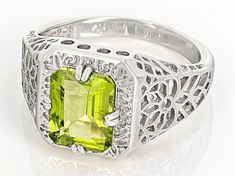 Pre-Owned 2.20ct Emerald Cut Manchurian Peridot™ Rhodium Over Sterling Silver Ring. Measures Approximately 0.81"L x 0.47"W. Not Sizeable..  This product may be a customer return, vendor sample, or on-air display and is not in its originally manufactured condition.  It may not be new.  In some instances, these items are repackaged by JTV. Green Peridot, Emerald Cut, Sterling Silver Ring, Silver Ring, Sterling Silver Rings, Emerald, Silver Rings, Sterling Silver, Ring