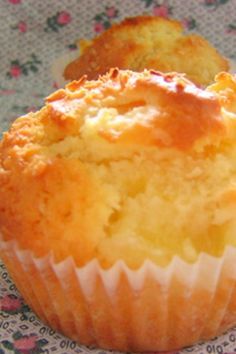 two muffins sitting on top of a table