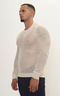 Dare to stand out with our See Through Fishnet Muscle Fit Shirt, the epitome of rebellious style and confidence. Crafted from high-quality fishnet fabric, this shirt offers a unique blend of sensuality and streetwear flair. Designed to showcase your physique, the muscle fit silhouette hugs your body in all the right places, accentuating your muscular build and adding a touch of allure to your look. The see-through nature of the fishnet fabric adds an element of mystery and intrigue, allowing you White Casual Mesh Top With Mesh Sleeves, Casual White Mesh Top With Mesh Sleeves, Fitted Mesh Top With Open Knit, Fitted Mesh Open Knit Top, Fall Fishnet Mesh Top, Long Sleeve Top With Mesh Back For Spring, Casual Fishnet Tops For Summer, Casual Fishnet Mesh Top, Casual Stretch Fishnet Tops