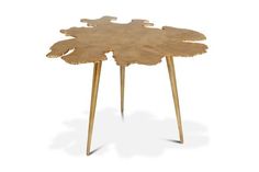 a wooden table with three legs and a flower design on the top that is shaped like a leaf