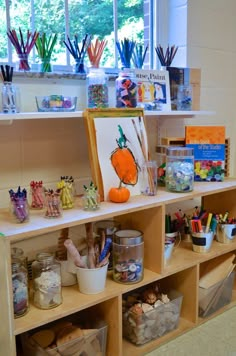 an image of a school room with many items on the shelf and in front of it