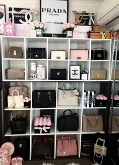 a room filled with lots of purses and handbags on shelves next to each other