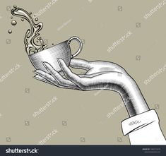 a hand holding a coffee cup with steam coming out of it