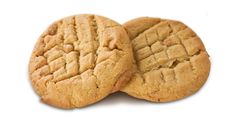 two peanut butter cookies sitting on top of each other