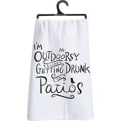 a white towel hanging on a hook with the words i'm outdoorsy getting drunk and paris printed on it