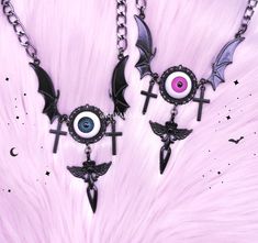 Creepycute necklace with EYES bat wings cross o-ring. Perfect jewelry for styles like: cute harajuku, menhera, kawaii, gothic, pastel goth, altcore 2 color of EYE: PINK / TURQUOISE LENGHT: ~45cm (17.72) plus 5cm (1.97) of regulation if you're looking for more necklaces: https://www.etsy.com/shop/MiyakaBizu?ref=seller-platform-mcnav&section_id=22229407 ATTENTION! Estimate shipping time is about 1-2 weeks to EU and 3-5 weeks to outside the EU. If you don't receive your order within limit time please contact with us. If you need faster package and detailed tracking let me know and I'll prepare courier:) Emo Necklaces For Halloween And Alternative Fashion, Harajuku Style Black Jewelry, Emo Jewelry For Halloween Cosplay, Harajuku Style Halloween Jewelry Gift, Pink Punk Halloween Jewelry, Pink Punk Style Necklace For Party, Pink Punk Necklace For Party, Pink Gothic Jewelry For Halloween, Handmade Pink Gothic Jewelry