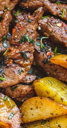 steak and potatoes with herbs on a plate