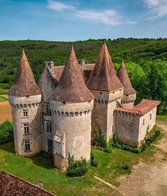 an aerial view of a castle in the countryside