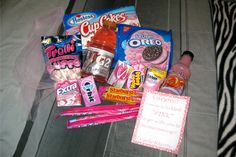 some candy and other items on a bed