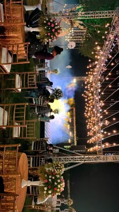 an outdoor event with lights and chairs