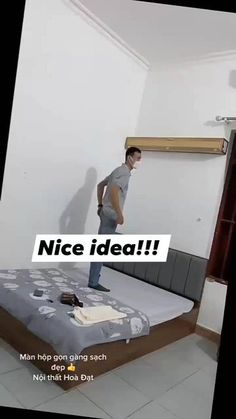 a man standing in front of a bed with the caption nice idea on it