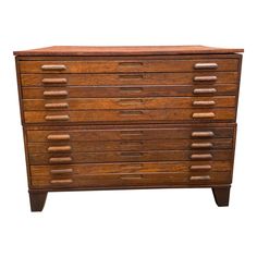 an old wooden dresser with many drawers