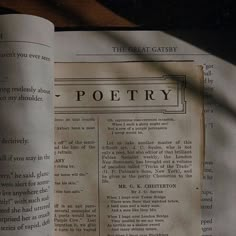 an open book with the words poetry written on it's front page and in between two pages