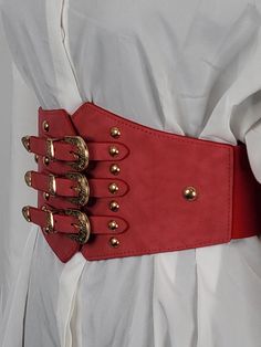 Women’s Watermelon Rose Red Corset Belt with Gold Buckles – Sultry Style Meets Elegance Embellish your wardrobe with this stunning Watermelon Rose Red Corset Belt, featuring three elegant gold buckles. Perfect for adding a bold, vintage-inspired touch to your outfits. Chic Design: Under-bust, wide-waisted belt inspired by sultry aesthetics, ideal for accentuating your curves. High-Quality Materials: Made from durable polyester and PU leather, ensuring comfort and longevity. Effortless Wear: Equi High Waisted Belts, Red Corset Belt, Red Leather Corset, Belt Inspiration, Corset Belt Outfit, Waist Corset Belt, Watermelon Rose, Corset Waist Belt, Sultry Style