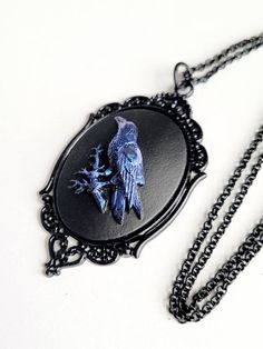 JUST LISTED Blue Iridescent Raven Crow Gothic Rockabilly Cameo Black Necklace Pendant Victorian Jewelry Hand painted cameo If you are wanting a specific color of roses please feel free to contact me and I will do my best to create what you are searching for. Victorian Jewelry substantial in size at just a little over 2 INCHES Long Center is 40mmx30mm **MATCHING ITEMS IN OUR STORE BADGE HOLDER BROOCH HAIR PINS - CLIPS** **thank you for taking the time to look at our items. Each item is handcrafte Wandering Trader, Color Of Roses, Gothic Rockabilly, Crow Jewelry, Crow Necklace, Raven Jewelry, Gothic Crown, Thanksgiving Clothes, Raven Pendant