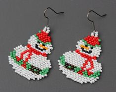 the beaded snowman earrings are decorated with beads