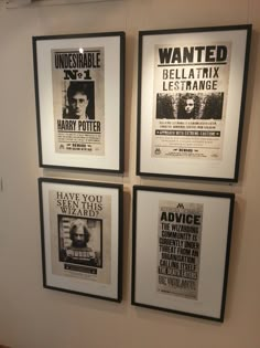 three framed movie posters hang on the wall