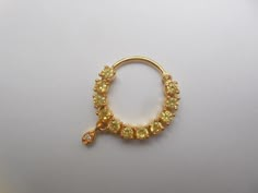 Golden Nose Piercing, Nose Ring Indian, Unique Nose Rings, Yellow Stone Rings, Gold Nose Hoop, Golden Crystal, Crystal Uses, Ring Indian, Gold Nose Rings