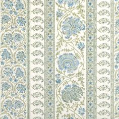 an upholstered wallpaper with blue flowers and leaves on white, green and blue stripes