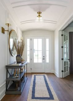 the hallway is clean and ready for us to use as an entrance way in this home