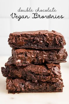 three chocolate brownies stacked on top of each other