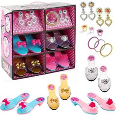 the doll house has many pairs of shoes and accessories in it