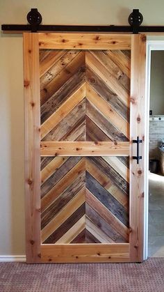 a door made out of wooden planks in a room with carpeting on the floor