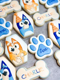 decorated cookies with blue and orange designs on them