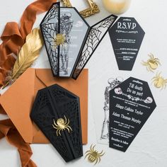 an assortment of halloween themed wedding stationery items