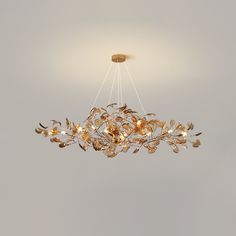 a chandelier hanging from the ceiling in a room