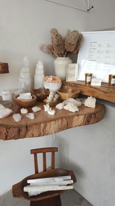 a wooden table topped with lots of different items