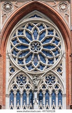 an ornate stained glass window on the side of a building royalty photo and royalty illustration