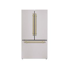 a white refrigerator freezer sitting next to a metal handle on it's door