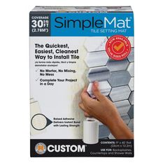 the simple mat adhesivee is being used to install tiles on walls and ceilings