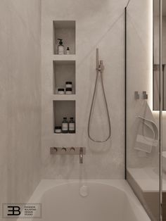 a bathroom with a shower head and shelves above the bathtub is shown in black and white