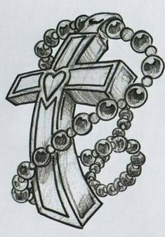 a drawing of the letter f with beads around it and a cross in the middle