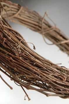 a close up of a wreath made out of twigs