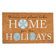 a door mat that says, there's no place like home for the holidays